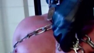 MuscleJockBound.com - Submissive man futilely struggles while in heavy chains, domina