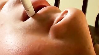 This hot smooth country jock chainsmokes while stroking and using a buttplug