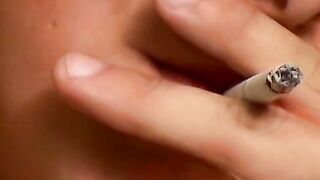 This hot smooth country jock chainsmokes while stroking and using a buttplug