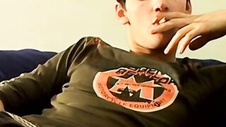 Hung Antony puffs his cigarette while stroking his big dick