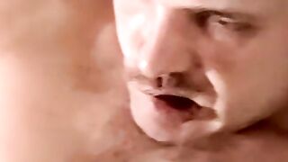 Young athletic amateur strokes his big dick and unloads jizz