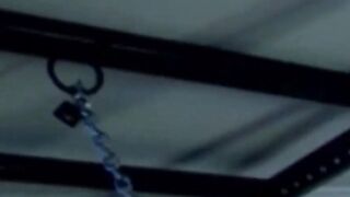 MuscleJockBound.com - Muscular man silenced with a ball gag while being heavily chain