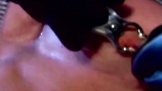 MuscleJockBound.com - Muscular man silenced with a ball gag while being heavily chain