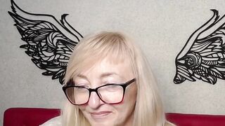 Blonde amateur MILF IngritSno with glasses on webcam