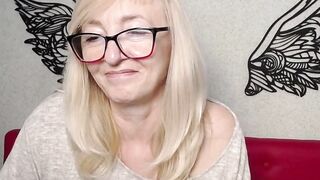 Blonde amateur MILF IngritSno with glasses on webcam