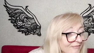 Blonde amateur MILF IngritSno with glasses on webcam