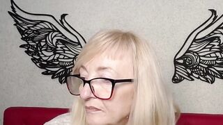Blonde amateur MILF IngritSno with glasses on webcam