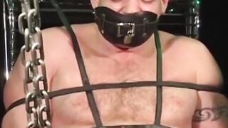 MuscleJockBound.com - Inked man in tight underwear tied up and subdued in a sensual a
