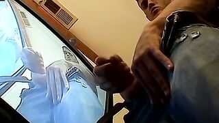 Thug pleases himself with his hands next to recording TV