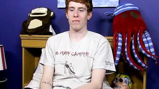 Guy with red hair gets interviewed before a solo session