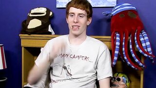 Guy with red hair gets interviewed before a solo session
