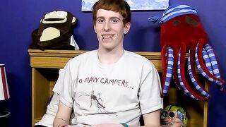 Guy with red hair gets interviewed before a solo session