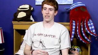 Guy with red hair gets interviewed before a solo session