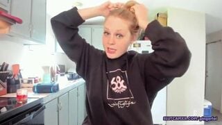 beauty blonde next door women is streaming inside the kitchen