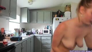 beauty blonde next door women is streaming inside the kitchen
