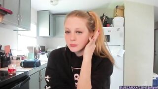beauty blonde next door women is streaming inside the kitchen