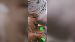 Cream On Bright Green African Feet And Foot