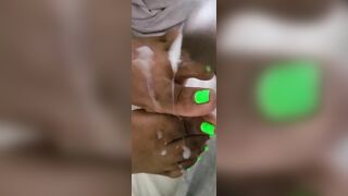 Cream On Bright Green African Feet And Foot