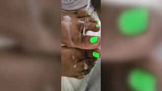 Cream On Bright Green African Feet And Foot