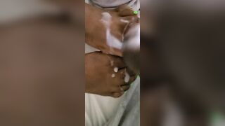 Cream On Bright Green African Feet And Foot