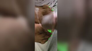 Cream On Bright Green African Feet And Foot