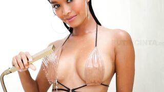 Perfectly Tanned Sexy Putri Cinta exposing her soak small cunt