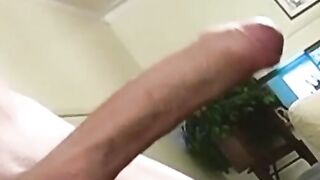 Hunky muscular stud with mask on his face masturbates