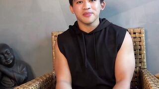 Asian American Sunny D tugs his uncut cock while doing an interview solo