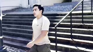 Asian American Sunny D tugs his uncut cock while doing an interview solo