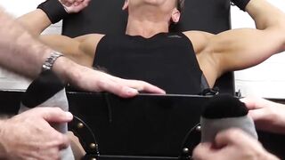 Two dudes tickle hunks feet and the rest of his body too