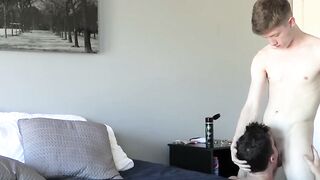 Barebacked twink cums with a dick in his ass