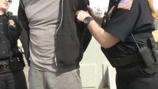 Big ass uniformed babes fuck a criminal on the rooftop