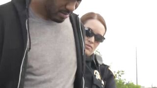 Big ass uniformed babes fuck a criminal on the rooftop