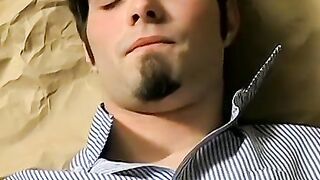 Hottie Ashley firing up his smoke before stroking his big dickÂ 