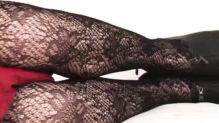 Hot redhead shemale with massive tits solo plays on a bed