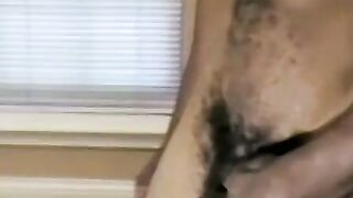 Athletic black jock jacks off his huge long cock and cums
