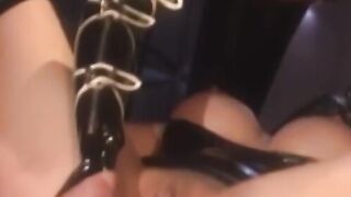 Kinky dominatrix uses sex toys on masked girl in latex suit