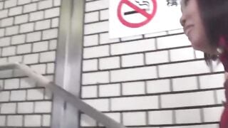 NipponPissTV.com - Amateur Oriental businesswoman caught pissing by voyeur in public