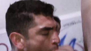 Group of men plays with a handsome hunk hard