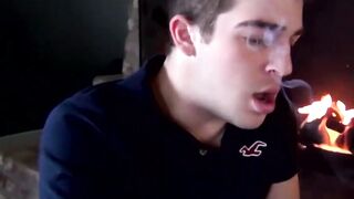 Sexy Austin smokes two at once before stroking his cock