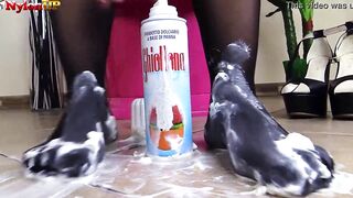 Dark Haired into tights offer turf job to a cream tube