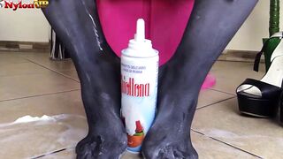 Dark Haired into tights offer turf job to a cream tube