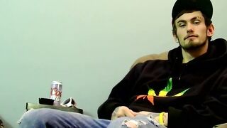 Young man goes naked and strokes his dick before cumming