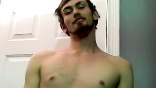 Young man goes naked and strokes his dick before cumming