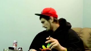 Young man goes naked and strokes his dick before cumming