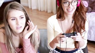 Two horny teens play with each others clits while gaming