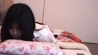 Naughty Japanese lady masturbating all alone