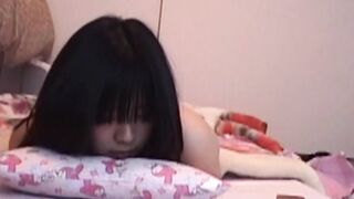 Naughty Japanese lady masturbating all alone