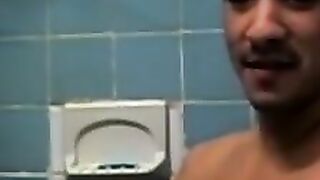 Amateur tattooed twink with a tan showers in classics porn