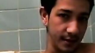 Amateur tattooed twink with a tan showers in classics porn